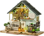 TuKIIE DIY Miniature House Kit with Furniture, 1:24 Scale Creative Room Mini Wooden Dollhouse Book Nook Plus Dust Proof & Music Movement for Kids Teens Adults(Plants Studio)